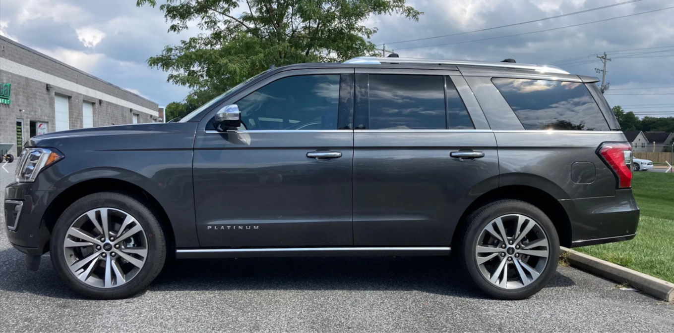 Car window tint safety for this SUV parked outside means that it won't reach dangerously high temperatures thanks to its window tint.